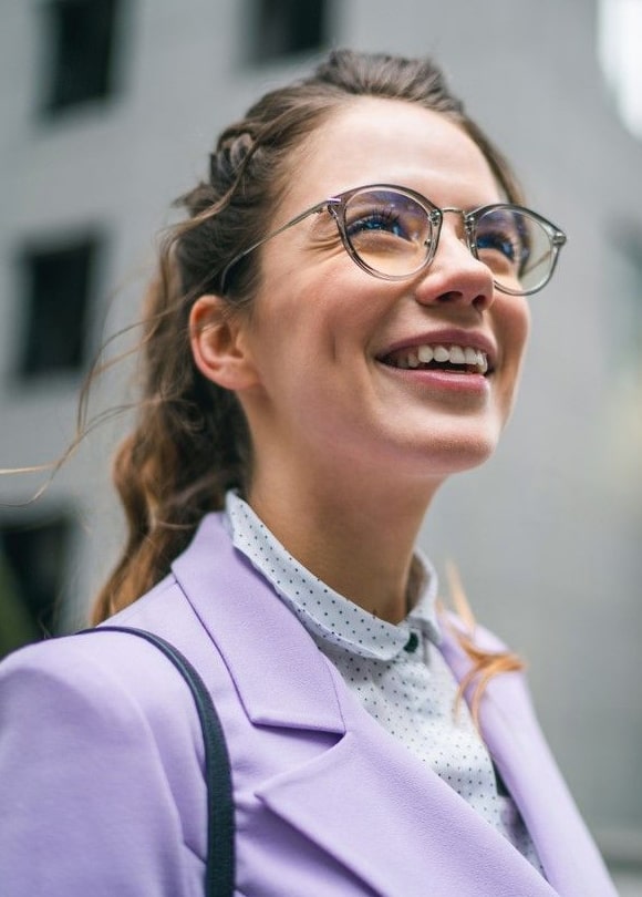 Happy woman with her high-quality eyeglass