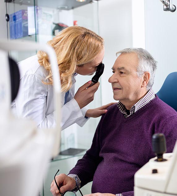 Doctor checking patients eye for Open-angle glaucoma at Premier Eyecare Assocaites.