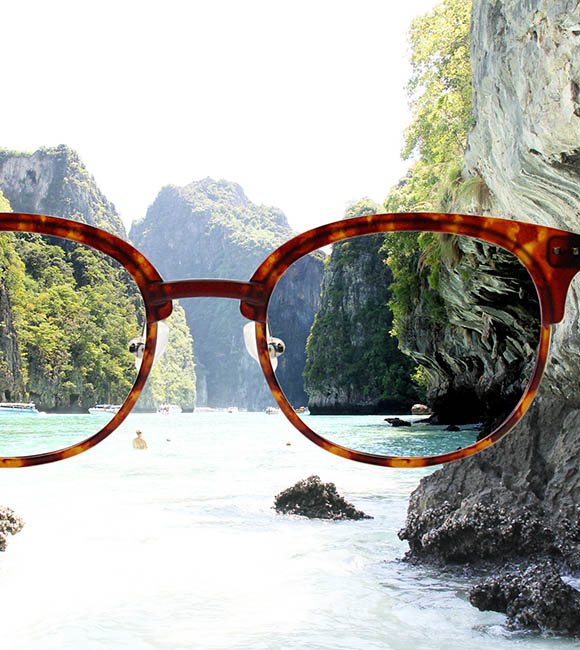 View of mountains and river though high index lenses