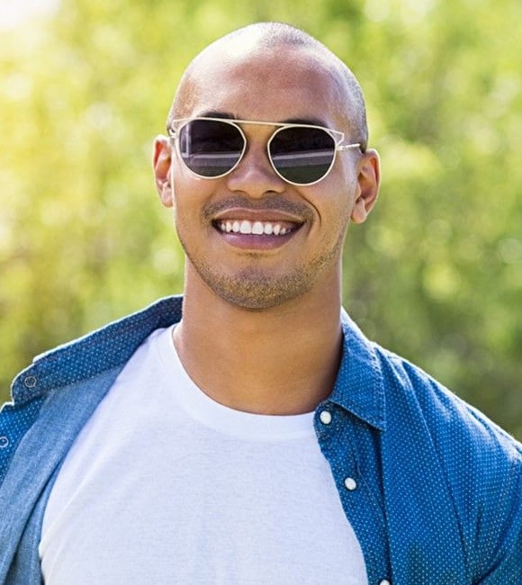 Man wearing photochromic sunglasses 