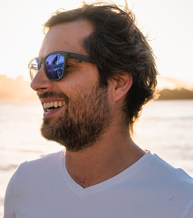 Man wearing sunglasses with cosmetic and specialty tints